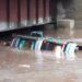 Driver, Conductor Escape Unhurt As Truck Plunges Into Nallah In Ajas Bandipora