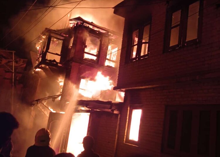Two houses gutted in massive blaze in Rajouri Kadal