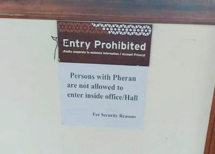 J&K Bank prohibits entry with Pheran at Sopore branch, cites security reasons