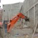 Municipal Committee Handwara Demolishes ‘Illegal’ Under-construction Shopping Complex