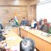Dir Information reviews performance, functioning of department